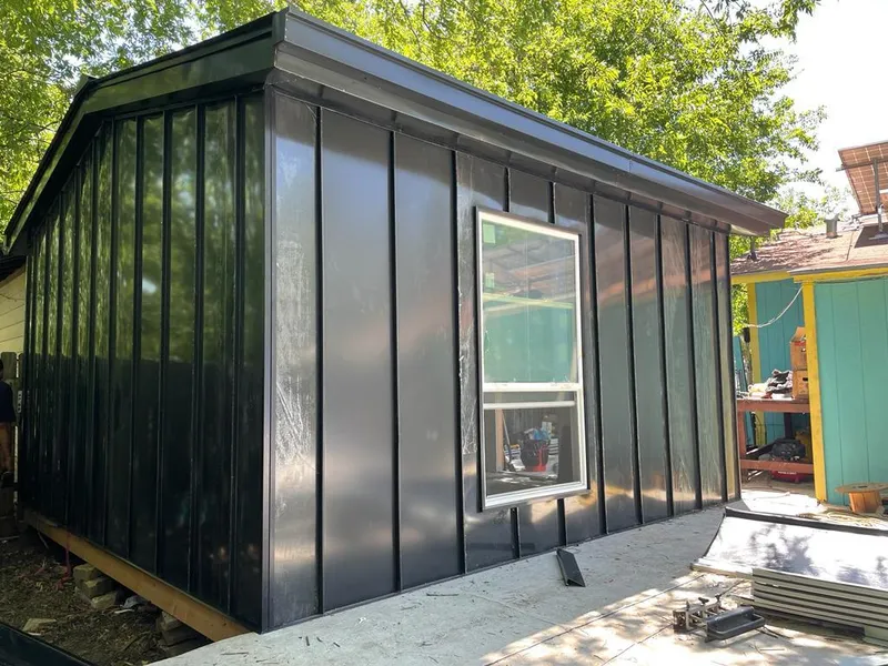 Black standing seam metal wall panels for Metal Roof Installation in West Falls Church