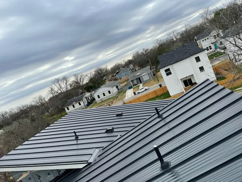 Standing seam metal roof panels with vents for Skylight Repair in West Falls Church